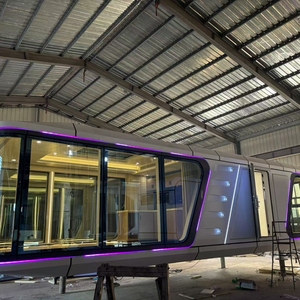 Yüksek kalite lüks modüler uzay kapsül villa prefabrik ev mobilyalı mutfak yatak odası tuvalet prefabrik minik ev