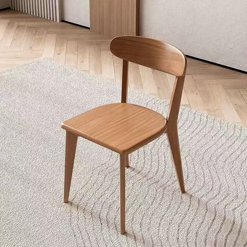 Two chairs in walnut color