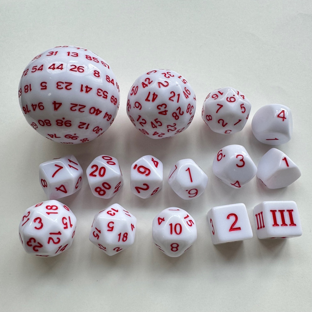 Set of 15 white dots with red oil