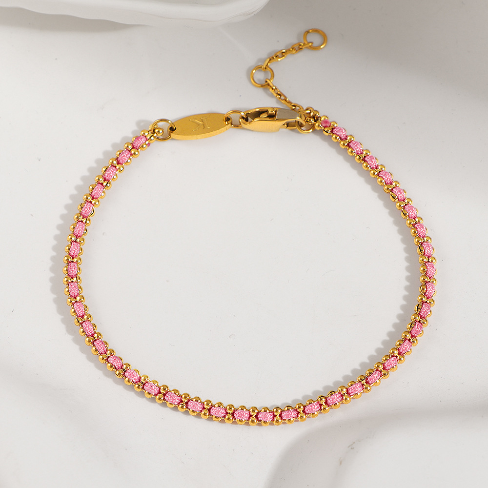 petit bracelet en corde rose tressée dorée