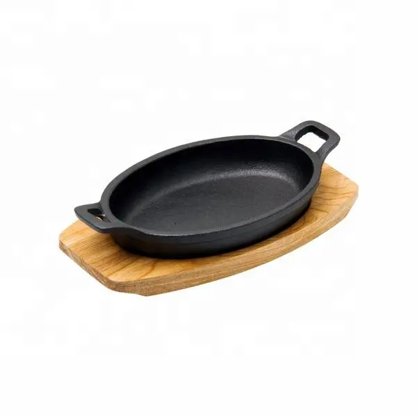 Pentole in ghisa smaltata nera opaca piatto sizzler ovale di piccole dimensioni con base in legno
