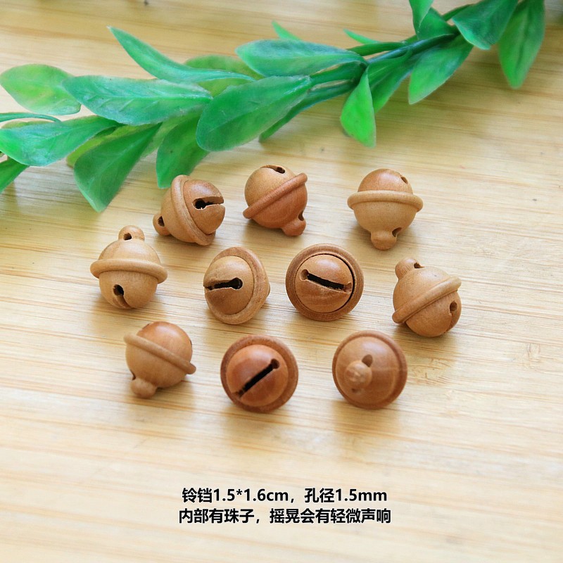 Peach wood bell pendant