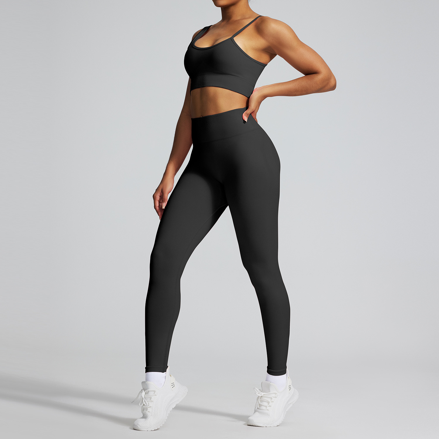 Black off-shoulder bra, black trousers