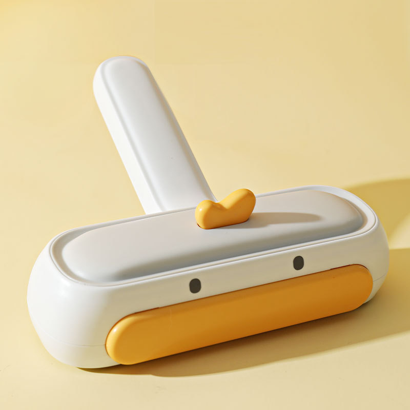 Yellow duck hair removal brush