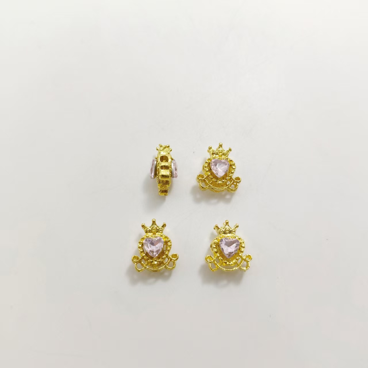 Gold-plated pink diamonds