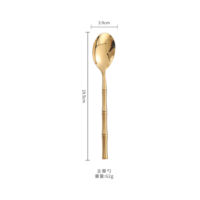 Cuchara de mesa dorada