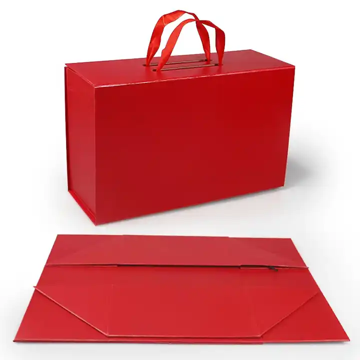 Red magnetic box with ribbon handle