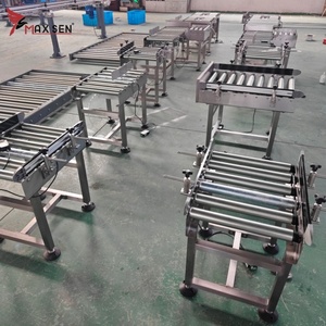Máquina de carga de alta calidad, transportador de rodillos motorizado, transportador de rodillos accionado por cadena para transporte de cesta de rotación - Product Image 3