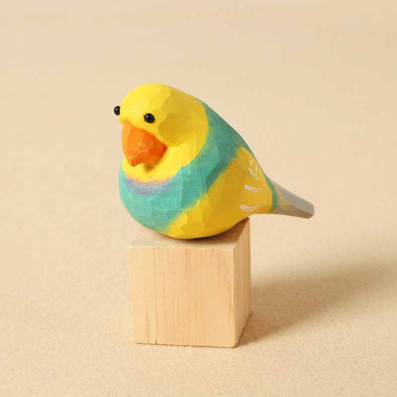 Bloc de bois perroquet jaune sculpté