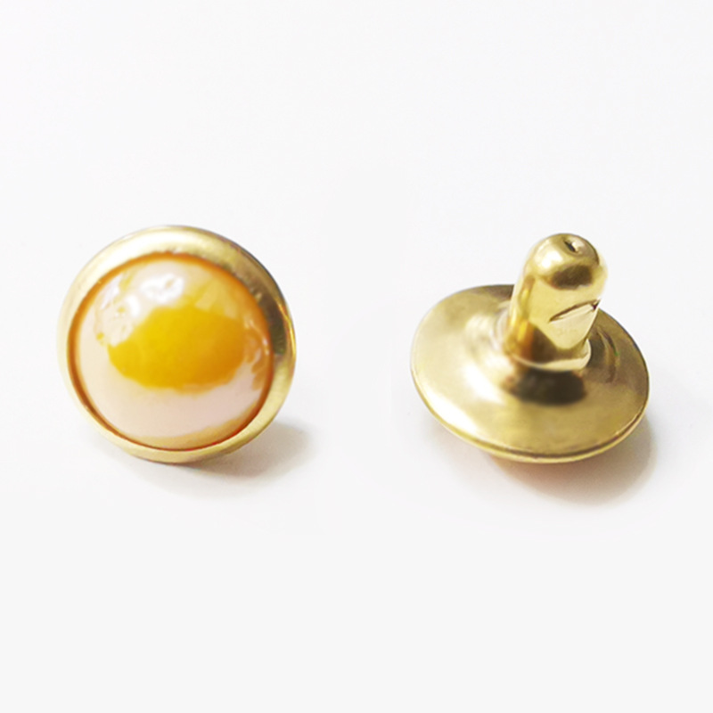 Clou oeil de chat 7,5mm avec manche ambre