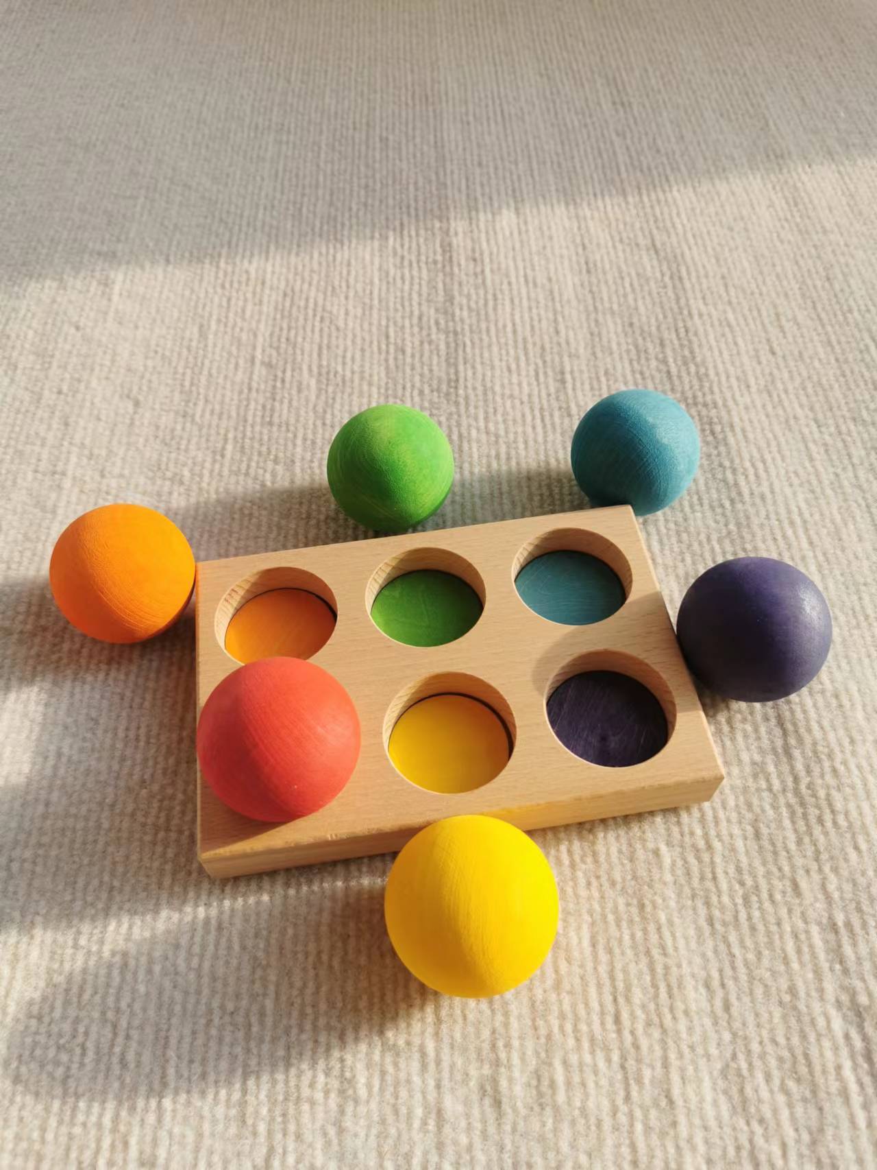 Boules de 4,5 cm dans un plateau en bois