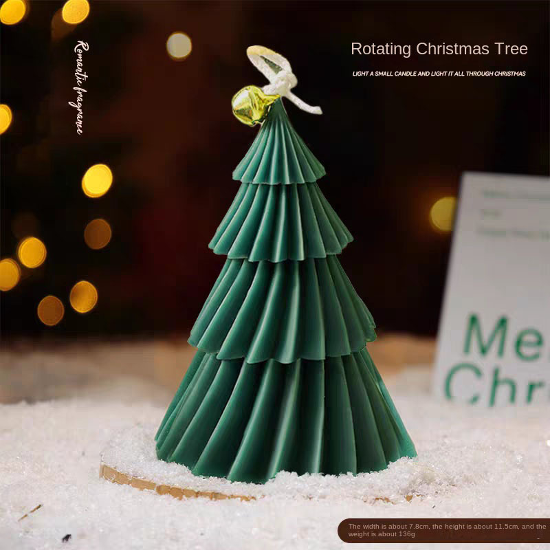 Bougie de Noël rotative GreenC en forme de sapin, présentée en boîte.