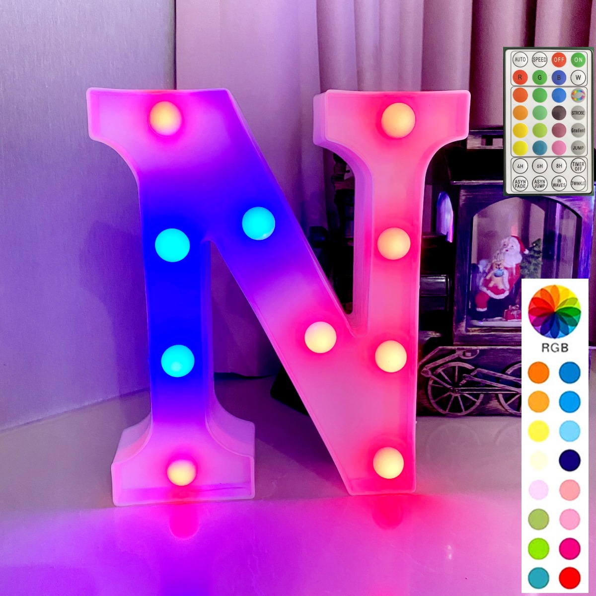 Lettre inférieure blanche de télécommande synchrone colorée : n