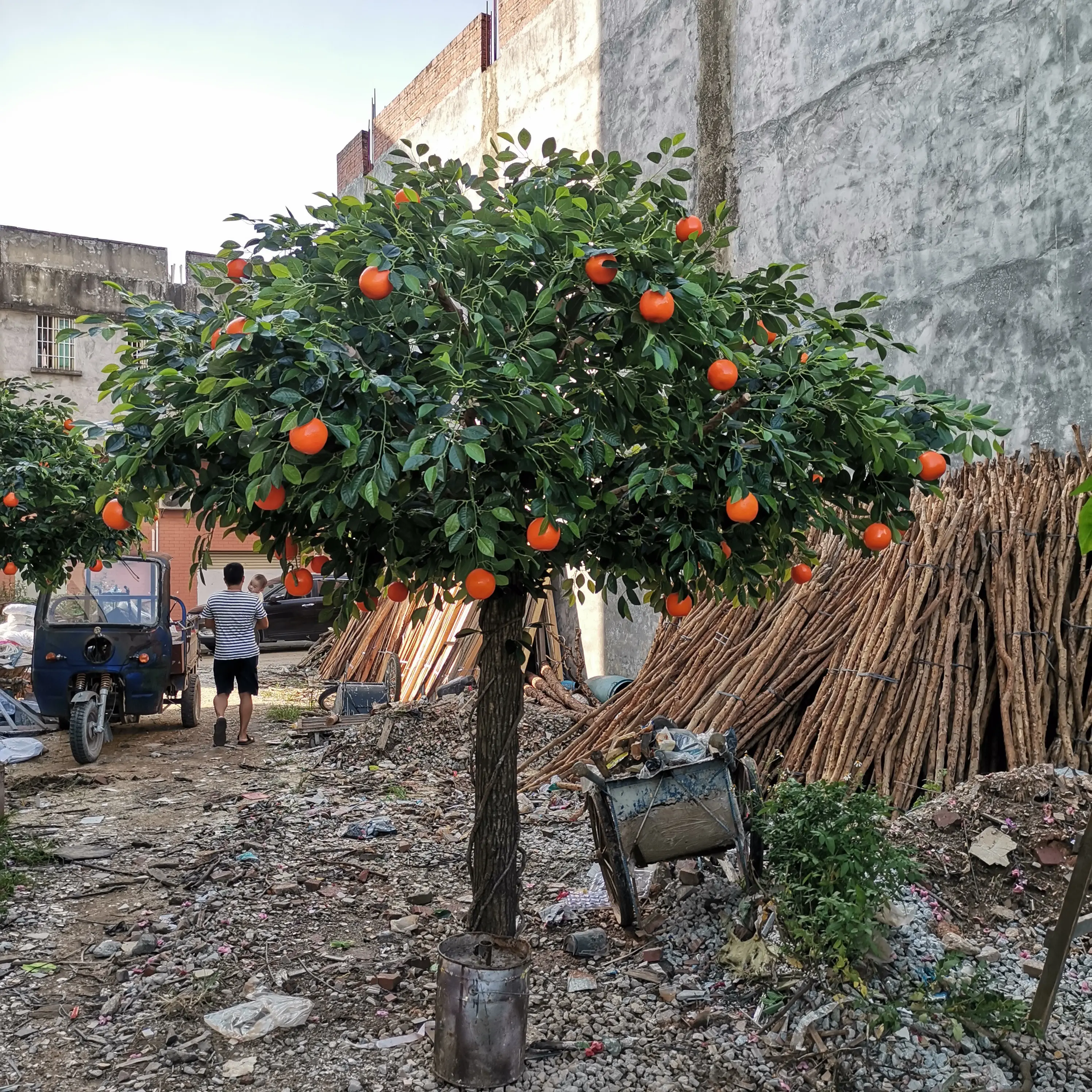 Albero arancione di plastica del Faux della decorazione domestica artificiale all'ingrosso dell'albero