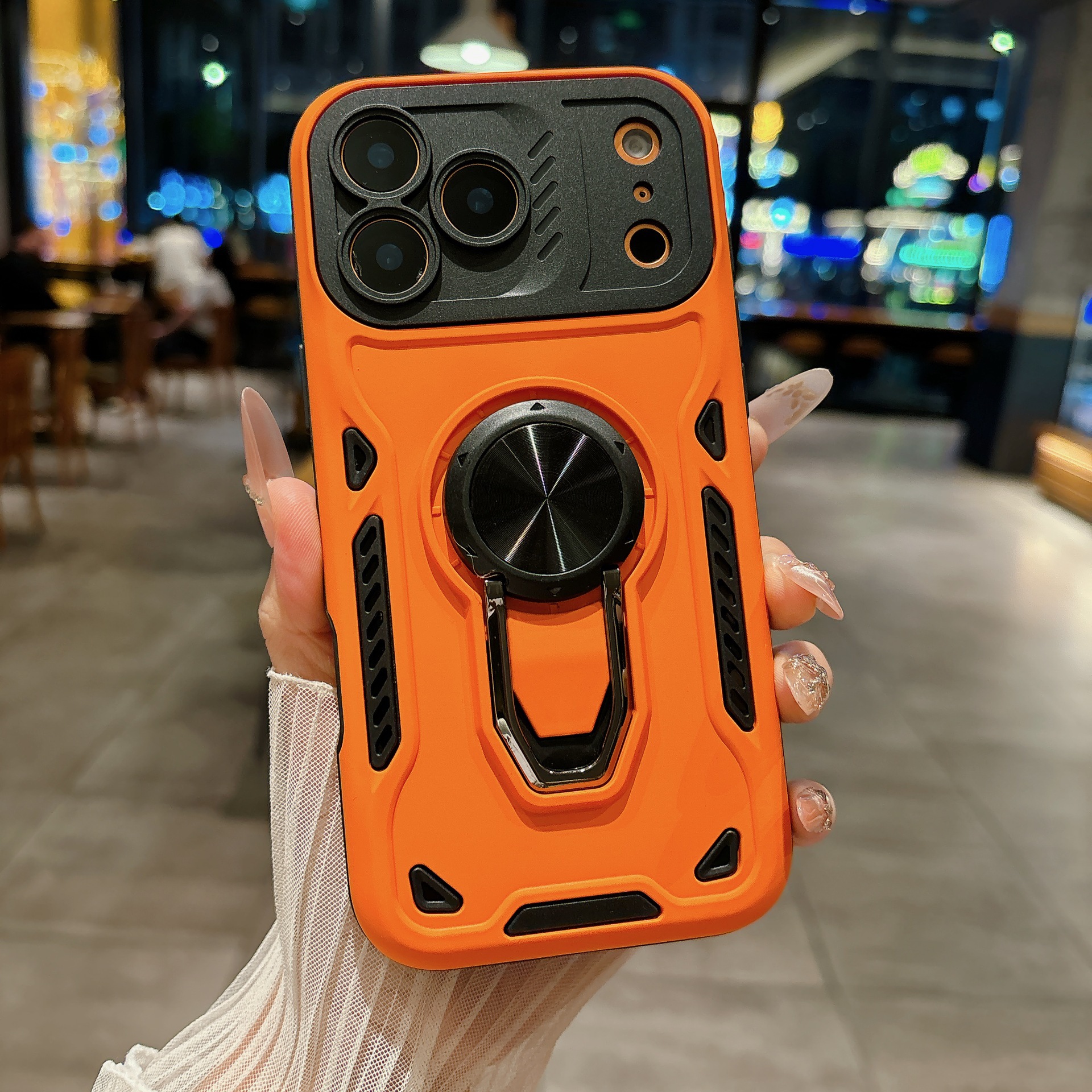 Funda naranja dos en uno con soporte giratorio.