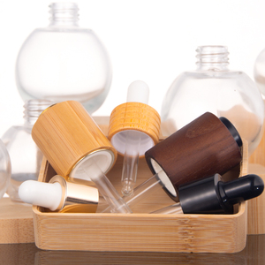 <strong>Empty</strong> Ball Shape Round clear Cosmetic Glass 30ml 50ml Essential Oil <strong>Bottles</strong> with <strong>Dropper</strong> Cap White Rubber Top with Cuticle Oil - Product Image 3