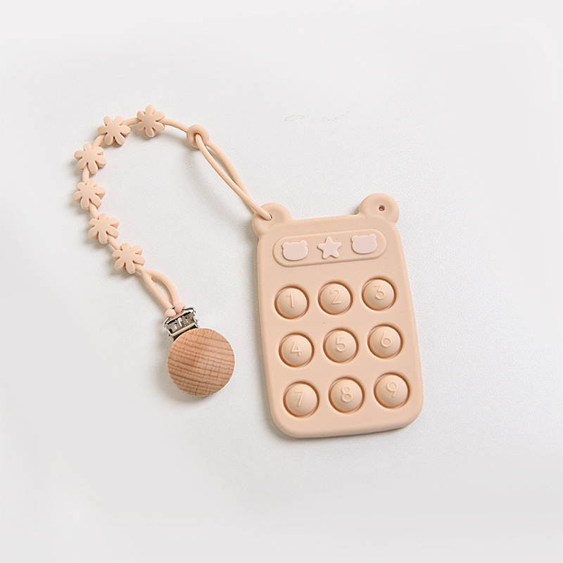 Juguete de clic color té con leche + cadena anticaída con clip de madera