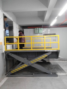Precio de fábrica Contenedor Muelle Camión Plataforma de trabajo de carga y descarga Motor personalizado para motor de tijera móvil Mesa de motor