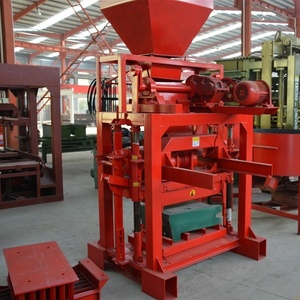 Máquina semiautomática de fabricación de bloques huecos de hormigón de cemento, procesamiento de moldes de ladrillo para pavimentación con componentes de núcleo de motor, número de unidad: 1, 2 - Product Image 3