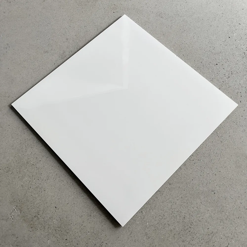 Azulejo de piso pulido esmaltado blanco puro de 60x60 de estilo conciso baldosas de cerámica de porcelana de bajo precio de fábrica Foshan para piso