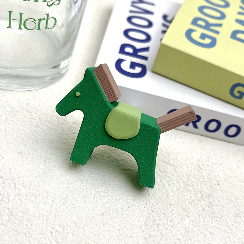 Poney vert foncé