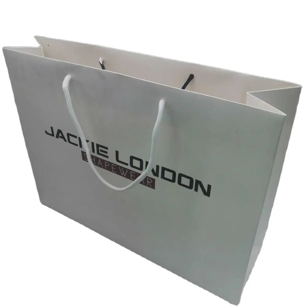 Free samples offered retail Luxury Clothes Packaging white brand paper bag with your own logo Apparel shopping bag