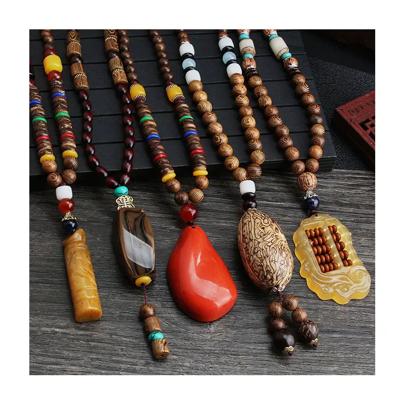 Vente en gros de bijoux boho pour hommes, collier vintage népalais, perles de bois tribales religieuses, bijoux faits main, collier avec pendentif en perles pour femmes