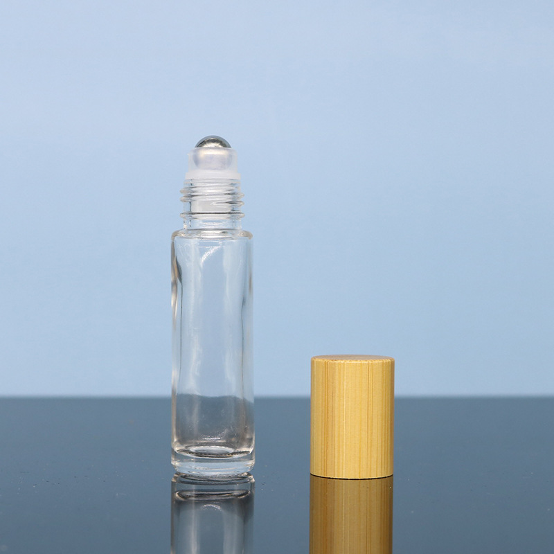 Bouteille transparente à roulement à billes