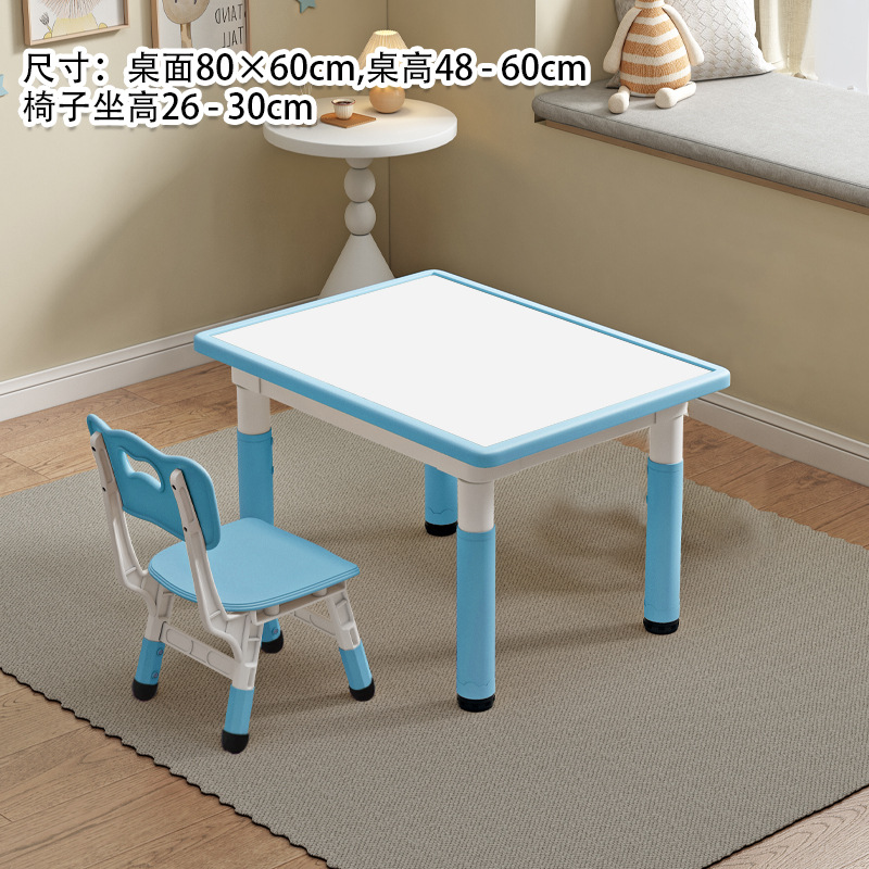 Tableau blanc, table et chaise bleu clair