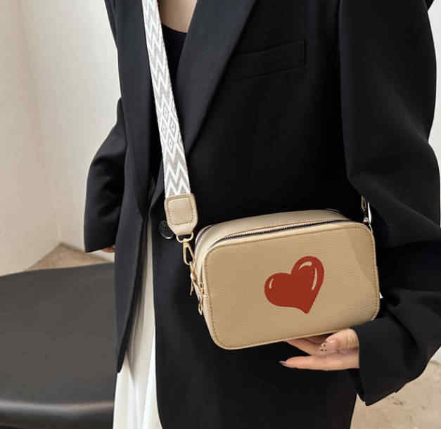2024, superventas, bolsos de moda de PU para mujer, nuevo estilo, Color sólido con decoración de corazón para damas, bolsos de lujo para mujer, uso diario
