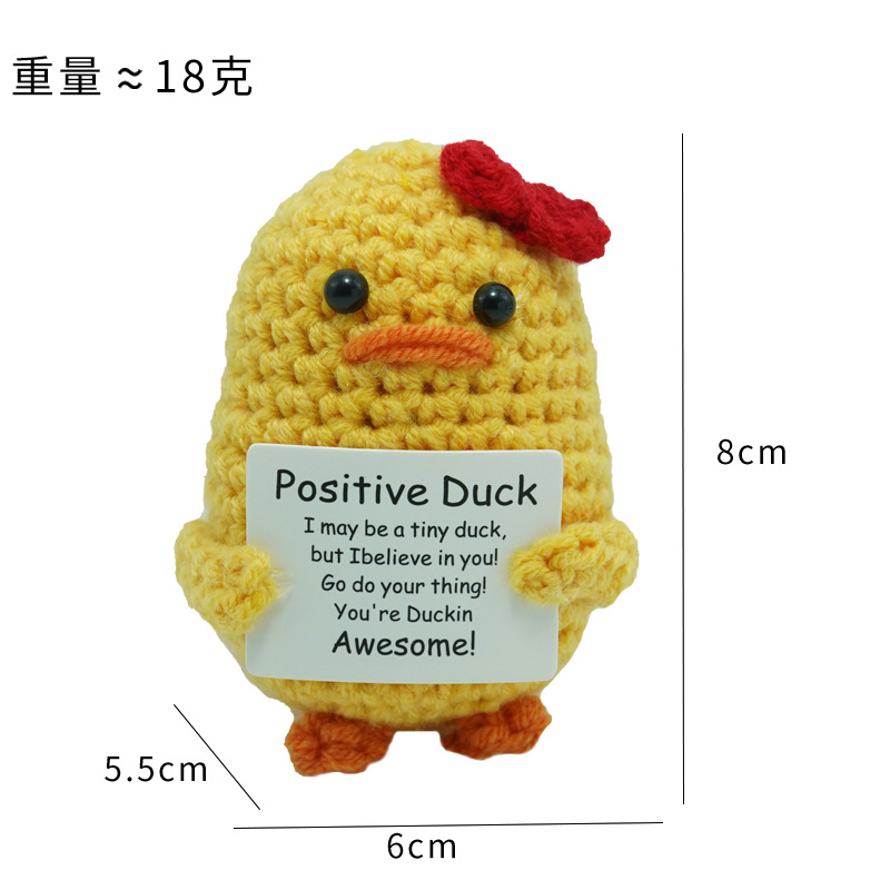 Tarjeta p de pato amarillo con lazo rojo