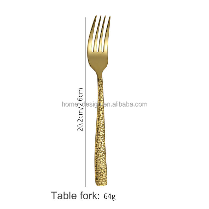 Fourchette de table argentée - or