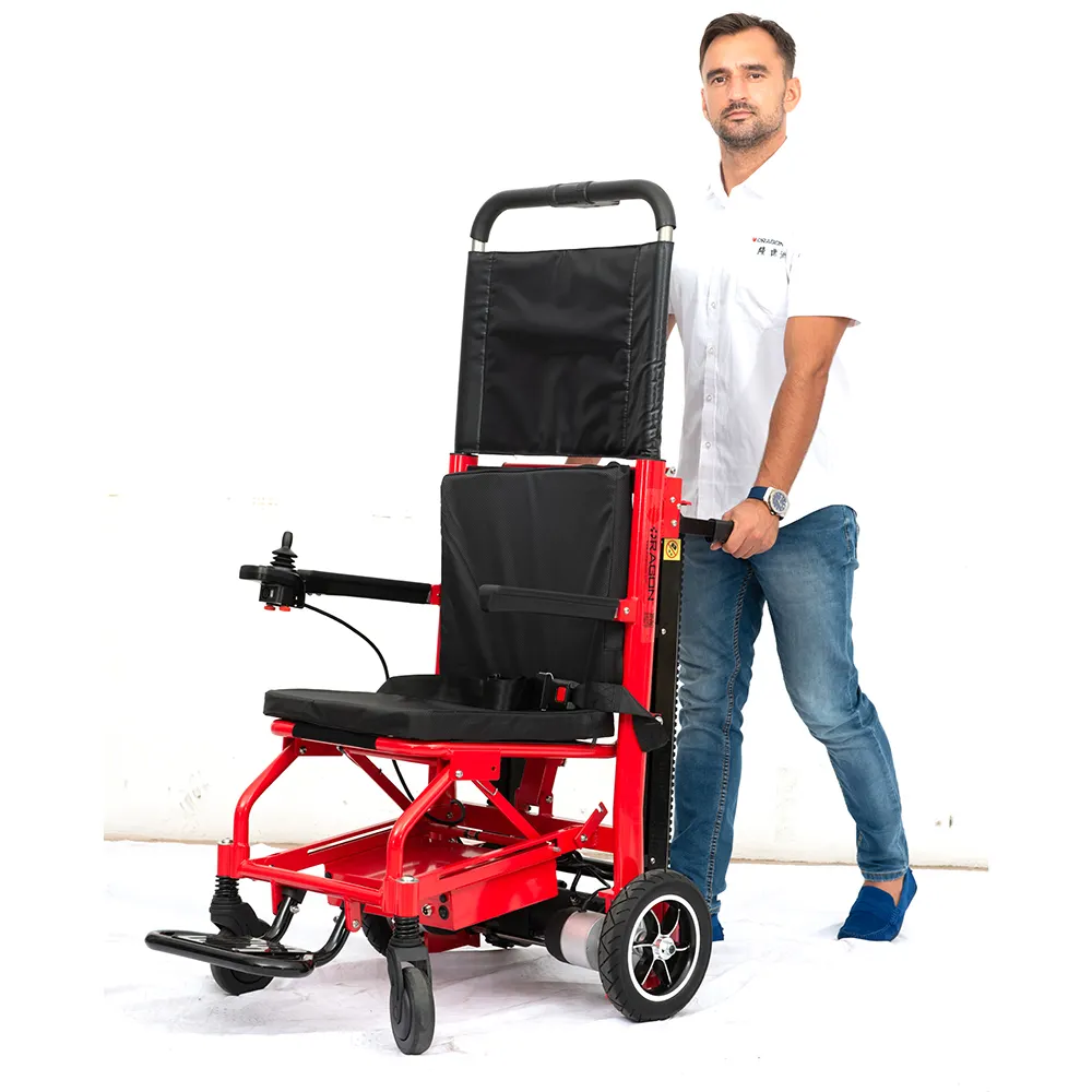 Macchina elettrica per salire le scale per trasportare la sedia a rotelle per salire le scale del paziente macchina per salire le scale di tipo cingolato pieghevole