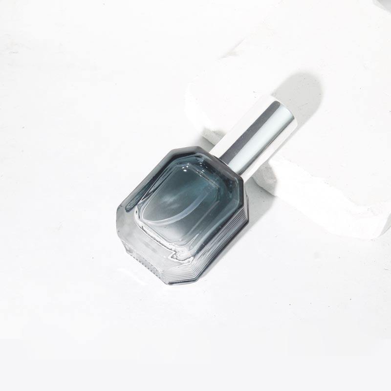 Dark green gradient bottle + silver nozzle cap