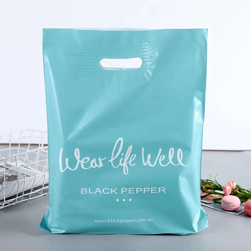 Sıcak satış kullanımlık özel logo baskılı pembe plastik alışveriş çantası yumuşak döngü kolu, baskılı plastik torba kolu ile