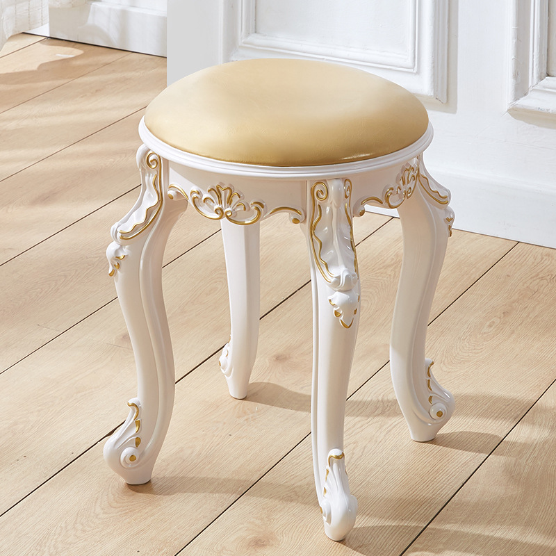 Tabouret rond en cuir plaqué or, hauteur 43 cm