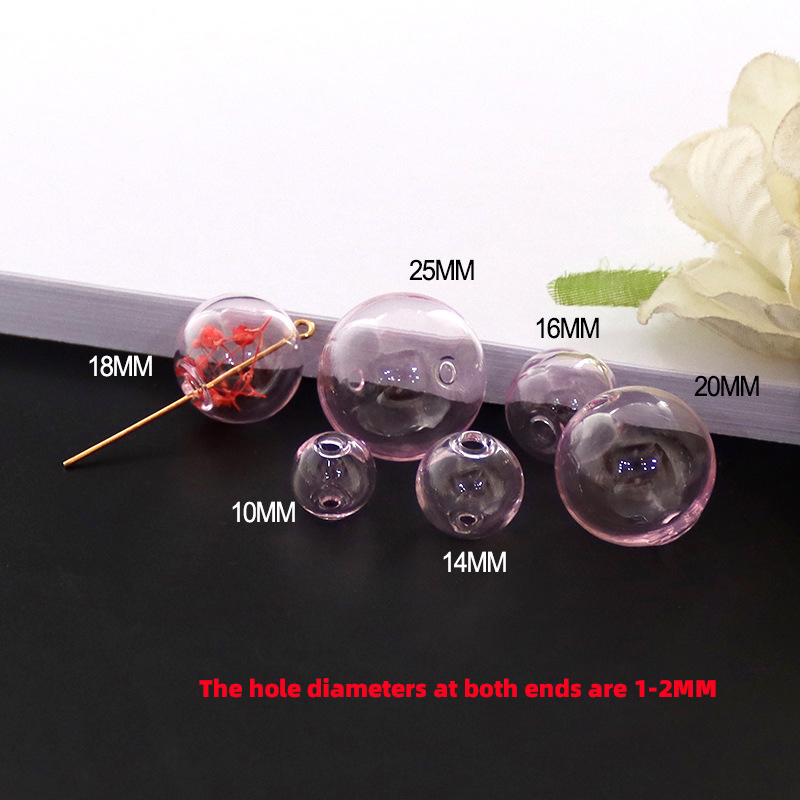 Boule en verre rose double trou