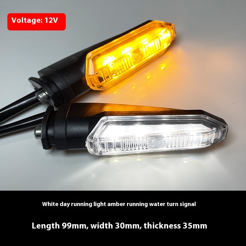 White daytime running light, yellow flowing turn signal light