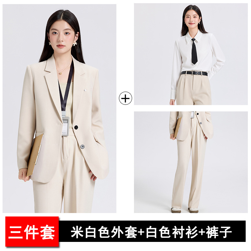 off-white suit, white shirt and trousers