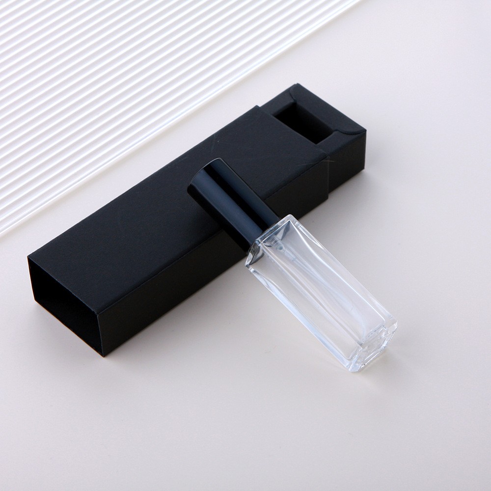 Botella pulverizadora de vidrio transparente + tapa negra + caja negra