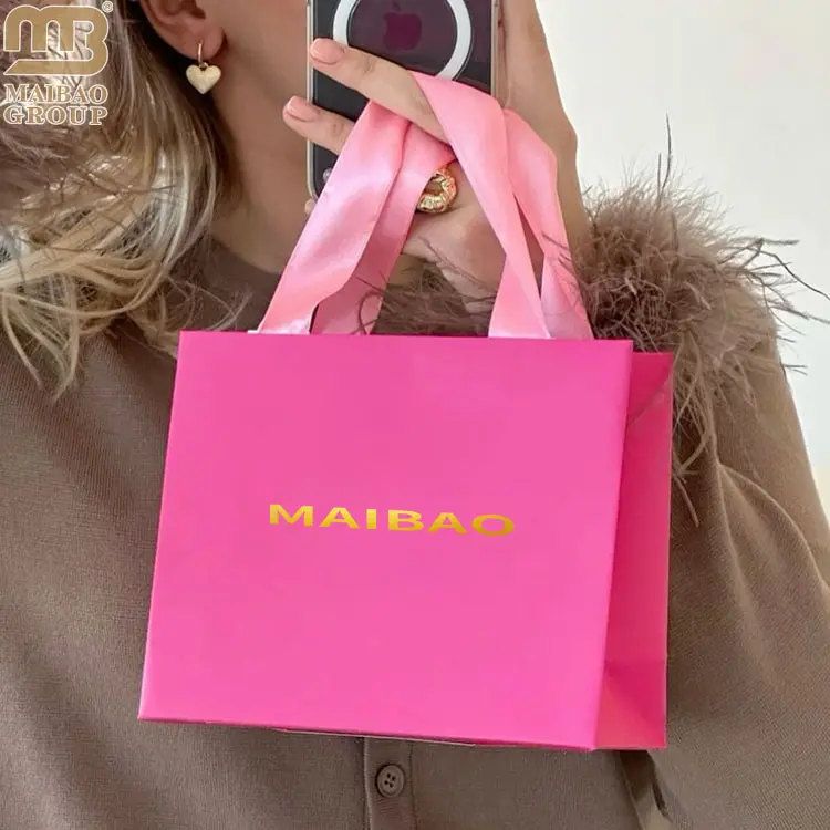 Borsa per la spesa regalo di gioielli in carta di cartone rosa nero di lusso con stampa personalizzata all'ingrosso piccole borse per boutique cosmetiche di abbigliamento bianco