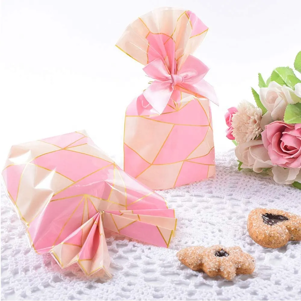 Confezione di 100 pezzi rosa reticolo del opp/cpp sacchetti di caramelle di plastica favore di cellophane sacchetti di trattare