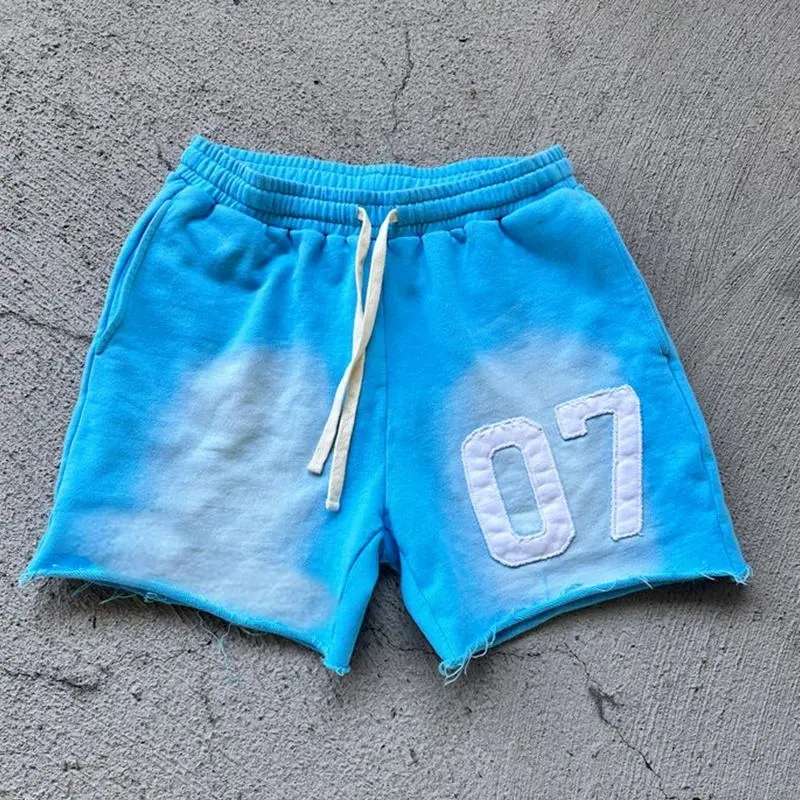 OEM & ODM pantaloni pesanti di cotone grezzo con orlo acido strappati in pile semplice pantaloncini sportivi da jogging Cargo con coulisse