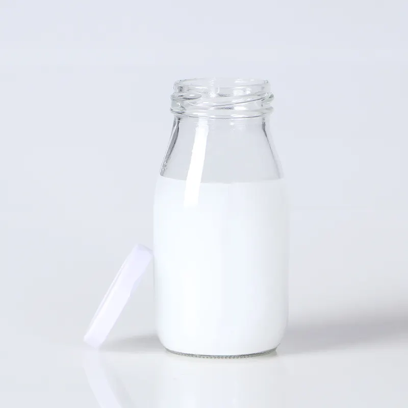 Toptan boş 200 ml 250 ml 500 ml 16 oz 1 litre süt depolama ambalaj cam kapaklı şişeler