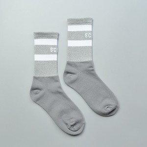 卸売デザインファッショングローナイトランニングクルー男性反射ソックス