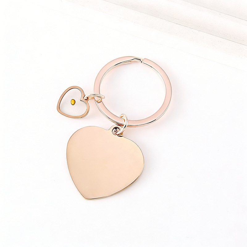 Llavero de colza en forma de corazón de oro rosa
