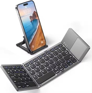 Mini teclado Bluetooth plegable portátil de 64 teclas con panel táctil, adecuado para ordenadores portátiles recargables y - Product Image 6