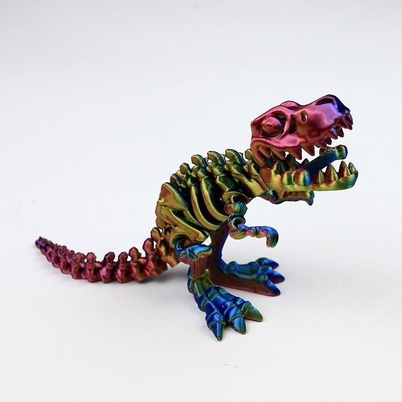 Tyrannosaure rex bleu or rouge 16cm