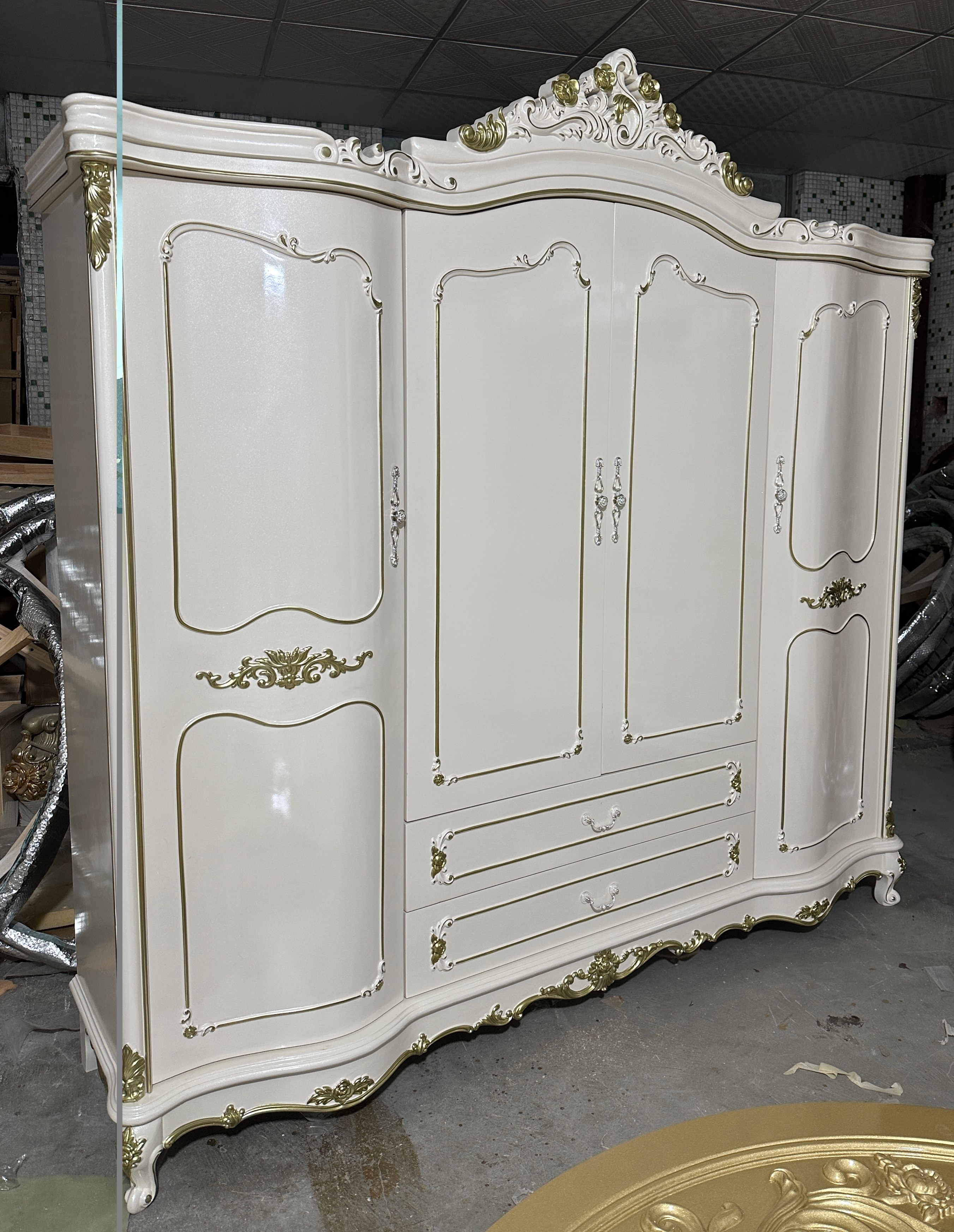 White wardrobe with four doors.