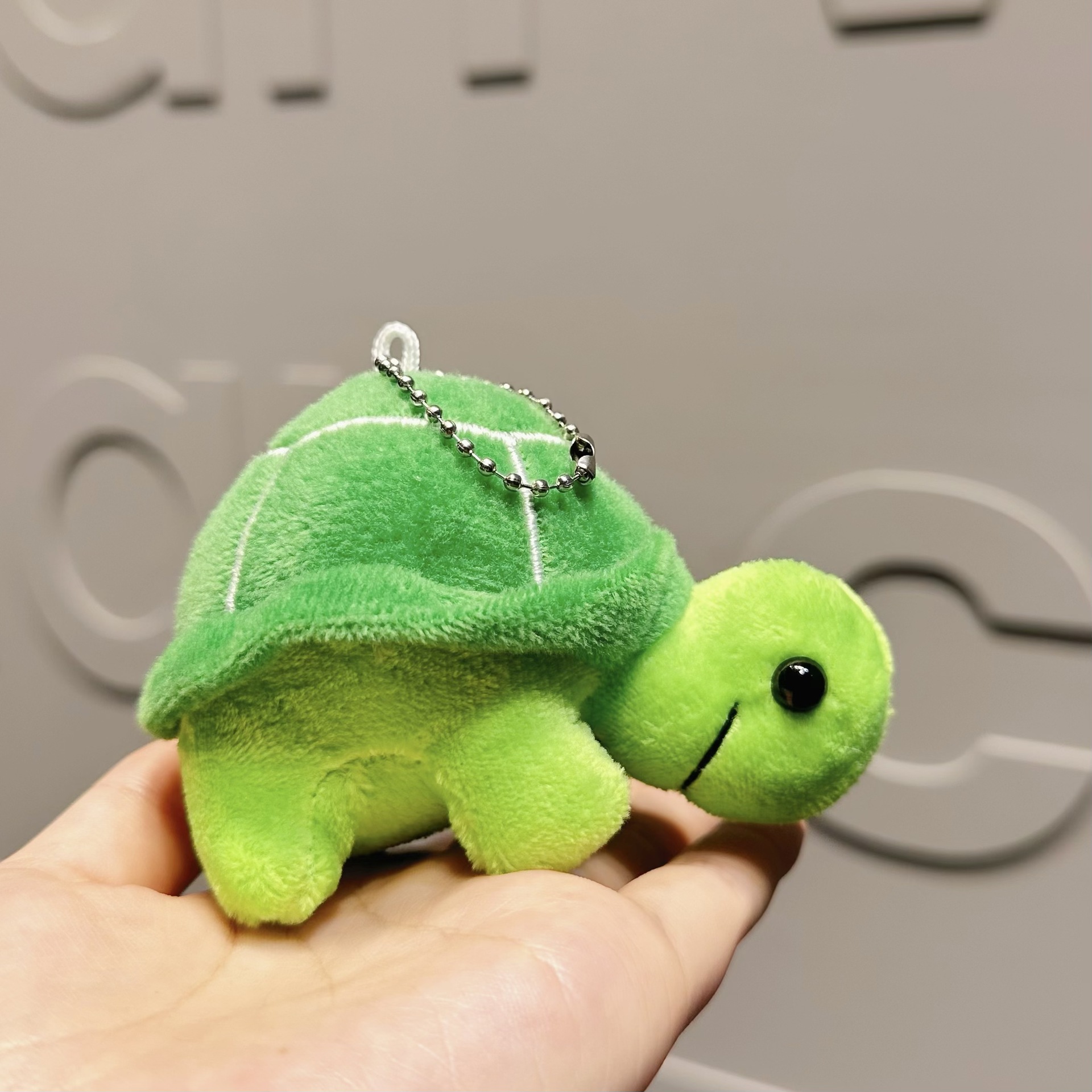 Peluche tortue-chaîne argentée couleur unie vert